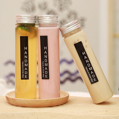 Leak proof Milk Tea Bottles Plastic Screw on Lid Durable Reusable Containers Ideal for Beverage Packaging and Storage