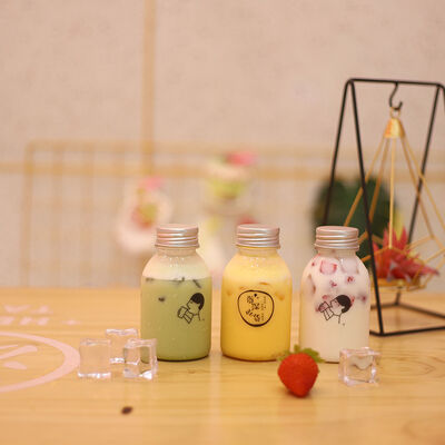 بطری‌های شیر چای پلاستیکی با دسته و درب پیچی، راه‌حل‌های بسته‌بندی نوشیدنی با قابلیت حمل راحت