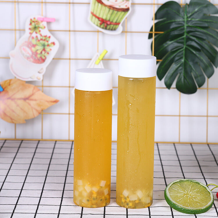 دستگیره بله بطری های چای شیر 05 کیلوگرم پیچ بر روی پوشش طراحی ضد نشت ایده آل برای بسته بندی و توزیع نوشیدنی های تجاری