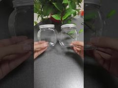 شیشه های پلاستیکی PET شفاف برای آب نبات، بیسکویت و آجیل، شیشه های بسته بندی مواد غذایی دهان گشاد